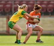 4 August 2018; Maebh Moriarty of Armagh in action against Yvonne Bonner of Donegal during the TG4 All-Ireland Ladies Football Senior Championship quarter-final match between Armagh and Donegal at Healy Park in Omagh, Tyrone. Photo by Oliver McVeigh/Sportsfile