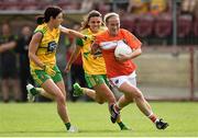 4 August 2018; Marian McGuinness of Armagh in action against Aoife McDonald and Niamh Hegarty of Donegal during the TG4 All-Ireland Ladies Football Senior Championship quarter-final match between Armagh and Donegal at Healy Park in Omagh, Tyrone. Photo by Oliver McVeigh/Sportsfile