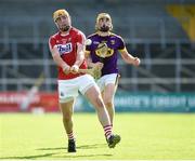 4 August 2018; Declan Dalton of Cork in action against Damien Reck of Wexford during the Bord Gáis Energy GAA Hurling All-Ireland U21 Championship Semi-Final match between Cork and Wexford at Nowlan Park in Kilkenny. Photo by Matt Browne/Sportsfile