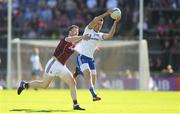 4 August 2018; Shane Carey of Monaghan in action against Gareth Bradshaw of Galway during the GAA Football All-Ireland Senior Championship Quarter-Final Group 1 Phase 3 match between Galway and Monaghan at Pearse Stadium in Galway. Photo by Ramsey Cardy/Sportsfile