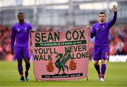 4 August 2018; Georginio Wijnaldum, left, and Andy Robertson of Liverpool hold a banner in support of Liverpool supporter Sean Cox following the Pre Season Friendly match between Liverpool and Napoli at the Aviva Stadium in Dublin. Photo by Seb Daly/Sportsfile