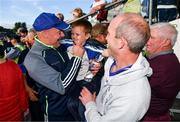4 August 2018; Monaghan manager Malachy O'Rourke celebrates with Paudie McCarey, aged 5, and his father Joe McCarey, from Gaeil Triucha, Co. Monaghan, after the GAA Football All-Ireland Senior Championship Quarter-Final Group 1 Phase 3 match between Galway and Monaghan at Pearse Stadium in Galway. Photo by Diarmuid Greene/Sportsfile