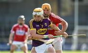 4 August 2018; Ian Carthy of Wexford in action against Declan Dalton of Cork during the Bord Gáis Energy GAA Hurling All-Ireland U21 Championship Semi-Final match between Cork and Wexford at Nowlan Park in Kilkenny. Photo by Matt Browne/Sportsfile