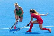 4 August 2018;  Chloe Watkins of Ireland under pressure from Lucia Jimenez of Spain during the Women's Hockey World Cup Finals semi-final match between Ireland and Spain at the Lee Valley Hockey Centre in QE Olympic Park, London, England. Photo by Craig Mercer/Sportsfile