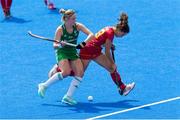 4 August 2018;  Gillian Pinder of Ireland battles with Georgina Oliva of Spain during the Women's Hockey World Cup Finals semi-final match between Ireland and Spain at the Lee Valley Hockey Centre in QE Olympic Park, London, England. Photo by Craig Mercer/Sportsfile