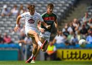 5 August 2018; Brian McLoughlin of Kildare scores his side's first goal as Brian O'Malley of Mayo closes in during the EirGrid GAA Football All-Ireland U20 Championship final match between Mayo and Kildare at Croke Park in Dublin. Photo by Piaras Ó Mídheach/Sportsfile