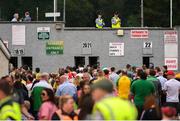 5 August 2018; Members of An Garda Síochána watch supporters arrive prior to the GAA Football All-Ireland Senior Championship Quarter-Final Group 2 Phase 3 match between Tyrone and Donegal at MacCumhaill Park in Ballybofey, Co Donegal. Photo by Stephen McCarthy/Sportsfile