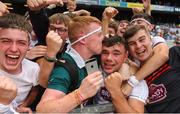 5 August 2018; DJ Earley of Kildare, centre, celebrates with supporters after the EirGrid GAA Football All-Ireland U20 Championship final match between Mayo and Kildare at Croke Park in Dublin. Photo by Piaras Ó Mídheach/Sportsfile