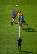 5 August 2018; Michael Darragh MacAuley, left, and Cian O'Sullivan of Dublin compete for the throw-in against Enda Smith, left, and Tadhg O'Rourke of Roscommon during the GAA Football All-Ireland Senior Championship Quarter-Final Group 2 Phase 3 match between Dublin and Roscommon at Croke Park in Dublin. Photo by Daire Brennan/Sportsfile