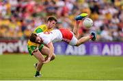 5 August 2018; Padraig Hampsey of Tyrone in action against Eoghan Bán Gallagher of Donegal during the GAA Football All-Ireland Senior Championship Quarter-Final Group 2 Phase 3 match between Tyrone and Donegal at MacCumhaill Park in Ballybofey, Co Donegal. Photo by Stephen McCarthy/Sportsfile