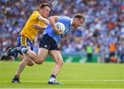5 August 2018; Cormac Costello of Dublin in action against Ross Timothy of Roscommon during the GAA Football All-Ireland Senior Championship Quarter-Final Group 2 Phase 3 match between Dublin and Roscommon at Croke Park in Dublin. Photo by Piaras Ó Mídheach/Sportsfile
