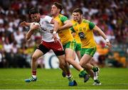 5 August 2018; Matthew Donnelly of Tyrone in action against Hugh McFadden of Donegal during the GAA Football All-Ireland Senior Championship Quarter-Final Group 2 Phase 3 match between Tyrone and Donegal at MacCumhaill Park in Ballybofey, Co Donegal. Photo by Oliver McVeigh/Sportsfile