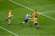 5 August 2018; Eoghan O'Gara of Dublin in action against Roscommon players, left to right, Darra Pettit, Niall McInerney, and David Murray during the GAA Football All-Ireland Senior Championship Quarter-Final Group 2 Phase 3 match between Dublin and Roscommon at Croke Park in Dublin. Photo by Daire Brennan/Sportsfile