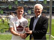 5 August 2018; Jimmy Hyland of Kildare is presented with his EirGrid Man of the Match award by John O’Connor, Chairman of EirGrid, following the EirGrid GAA Football U20 All-Ireland Final match between Kildare and Mayo at Croke Park. Photo by Piaras Ó Mídheach/Sportsfile