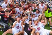 5 August 2018; Kildare players and backroom staff celebrate with the cup after the EirGrid GAA Football All-Ireland U20 Championship final match between Mayo and Kildare at Croke Park in Dublin. Photo by Piaras Ó Mídheach/Sportsfile