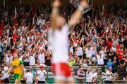 5 August 2018; Tyrone supporters celebrate their second goal during the GAA Football All-Ireland Senior Championship Quarter-Final Group 2 Phase 3 match between Tyrone and Donegal at MacCumhaill Park in Ballybofey, Co Donegal. Photo by Stephen McCarthy/Sportsfile