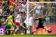 5 August 2018; Declan McClure of Tyrone shoots to score his side's second goal past Donegal goalkeeper Shaun Patton during the GAA Football All-Ireland Senior Championship Quarter-Final Group 2 Phase 3 match between Tyrone and Donegal at MacCumhaill Park in Ballybofey, Co Donegal. Photo by Stephen McCarthy/Sportsfile