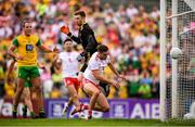 5 August 2018; Harry Loughran of Tyrone scores his side's opening goal past Donegal goalkeeper Shaun Patton during the GAA Football All-Ireland Senior Championship Quarter-Final Group 2 Phase 3 match between Tyrone and Donegal at MacCumhaill Park in Ballybofey, Co Donegal. Photo by Stephen McCarthy/Sportsfile