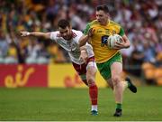 5 August 2018; Jamie Brennan of Donegal  in action against Ronan McNamee of Tyrone during the GAA Football All-Ireland Senior Championship Quarter-Final Group 2 Phase 3 match between Tyrone and Donegal at MacCumhaill Park in Ballybofey, Co Donegal. Photo by Oliver McVeigh/Sportsfile