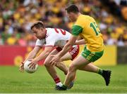 5 August 2018; Kieran McGeary of Tyrone in action against Jamie Brennan of Donegal during the GAA Football All-Ireland Senior Championship Quarter-Final Group 2 Phase 3 match between Tyrone and Donegal at MacCumhaill Park in Ballybofey, Co Donegal. Photo by Oliver McVeigh/Sportsfile