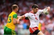 5 August 2018; Mattie Donnelly of Tyrone in action against Anthony Thompson of Donegal during the GAA Football All-Ireland Senior Championship Quarter-Final Group 2 Phase 3 match between Tyrone and Donegal at MacCumhaill Park in Ballybofey, Co Donegal. Photo by Stephen McCarthy/Sportsfile