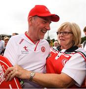 5 August 2018; Tyrone manager Mickey Harte is congratulated by a supporter following the GAA Football All-Ireland Senior Championship Quarter-Final Group 2 Phase 3 match between Tyrone and Donegal at MacCumhaill Park in Ballybofey, Co Donegal. Photo by Stephen McCarthy/Sportsfile