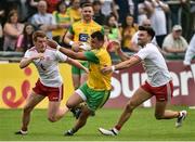 5 August 2018; Paul Brennan of Donegal  in action against Peter Harte and Tiernan McCann of Tyrone during the GAA Football All-Ireland Senior Championship Quarter-Final Group 2 Phase 3 match between Tyrone and Donegal at MacCumhaill Park in Ballybofey, Co Donegal. Photo by Oliver McVeigh/Sportsfile