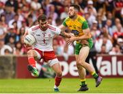 5 August 2018; Ronan McNamee of Tyrone in action against Mark McHugh of Donegal during the GAA Football All-Ireland Senior Championship Quarter-Final Group 2 Phase 3 match between Tyrone and Donegal at MacCumhaill Park in Ballybofey, Co Donegal. Photo by Oliver McVeigh/Sportsfile