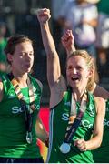 5 August 2018; Nicola Daly of Ireland celebrates receiving her silver medal with teammate Megan Frazer, right, after the Women's Hockey World Cup Final match between Ireland and Netherlands at the Lee Valley Hockey Centre in QE Olympic Park, London, England. Photo by Craig Mercer/Sportsfile