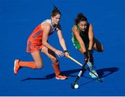 5 August 2018; Anna O’Flanagan of Ireland holds off the challenge of Marloes Keetels of the Netherlands during the Women's Hockey World Cup Final match between Ireland and Netherlands at the Lee Valley Hockey Centre in QE Olympic Park, London, England. Photo by Craig Mercer/Sportsfile