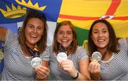 6 August 2018; Ireland players, from left, Nikki Evans, Katie Mullan and Anna O'Flanagan during the Irish Hockey Squad homecoming from the Women’s Hockey World Cup at Dublin Airport in Dublin. Photo by Eóin Noonan/Sportsfile