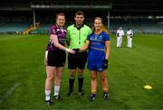 6 August 2018; Sligo captain Noelle Gormley and Wicklow captain Sarah Hogan exchange a handshake in the company of referee Eamonn Moran prior to the TG4 All-Ireland Ladies Football Intermediate Championship quarter-final match between Sligo and Wicklow at the Gaelic Grounds in Limerick. Photo by Diarmuid Greene/Sportsfile