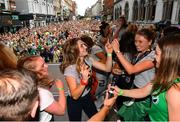 6 August 2018; Ireland's Emily Beatty, centre, dances on stage with teammates during their homecoming at Dame Street in Dublin after finishing second in the Women’s Hockey World Cup in London, England. Photo by Ramsey Cardy/Sportsfile