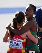 6 August 2018; Gina Akpe-Moses of Ireland, right, embraces Maria Izabel Pérez of Spain after competing in the Women's 100m Heats during Day Q of the 2018 European Athletics Championships at Berlin in Germany.  Photo by Sam Barnes/Sportsfile