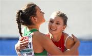 6 August 2018; Phil Healy of Ireland, left, and Ajla Del Ponte of Switzerland embrace after competing in the Women's 100m heats during Day Q of the 2018 European Athletics Championships at Berlin in Germany.  Photo by Sam Barnes/Sportsfile