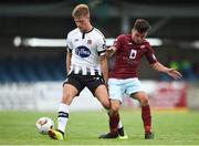 6 August 2018; Daniel Cleary of Dundalk in action against Stephen Christopher of Cobh Ramblers during the EA Sports Cup semi-final match between Cobh Ramblers and Dundalk at St. Colman's Park in Cobh, Co. Cork. Photo by Ben McShane/Sportsfile