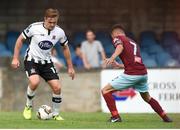6 August 2018; Georgie Poynton of Dundalk in action against Stephen Christopher of Cobh Ramblers during the EA Sports Cup semi-final match between Cobh Ramblers and Dundalk at St. Colman's Park in Cobh, Co. Cork. Photo by Ben McShane/Sportsfile