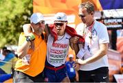 7 August 2018; Håvard Haukenes of Norway is helped by officals after finishing fourth in the Men's 50km Walk event during Day 1 of the 2018 European Athletics Championships in Berlin, Germany.  Photo by Sam Barnes/Sportsfile