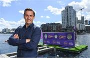 9 August 2018; England and Manchester United football legend Gary Neville touched down in Dublin today to officially launch the second year of Cadbury’s partnership with the Premier League, as ‘Official Snack Partner’. Accompanied by the Premier League Trophy, Gary paid a visit to Dublin’s Grand Canal Square to take part in the Cadbury Premier League Kicking Challenge – a penalty shootout where football fans were given the opportunity to win prizes, including flights and Premier League tickets, by scoring goals on a floating pontoon, in Grand Canal Dock. Photo by Ramsey Cardy/Sportsfile