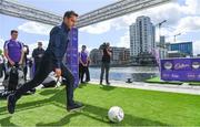 9 August 2018; England and Manchester United football legend, Gary Neville, touched down in Dublin today to officially launch the second year of Cadbury’s partnership with the Premier League, as ‘Official Snack Partner’. Accompanied by the Premier League Trophy, Gary paid a visit to Dublin’s Grand Canal Square to take part in the Cadbury Premier League Kicking Challenge – a penalty shootout where football fans were given the opportunity to win prizes, including flights and Premier League tickets, by scoring goals on a floating pontoon, in Grand Canal Dock. Photo by Ramsey Cardy/Sportsfile