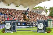 10 August 2018; Shane Sweetnam of Ireland competing on Main Road jumps the last during the second round of the Longines FEI Jumping Nations Cup of Ireland during the StenaLine Dublin Horse Show at the RDS Arena in Dublin. Photo by Matt Browne/Sportsfile