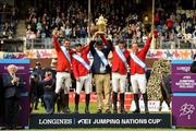 10 August 2018; President Michael D Higgins presents the Agha Khan Cup to the Mexico team, from left, Eugenio Garza Perez, Enrique Gonzalez, Chef d'Equipe Stanny van Paesschen, Patricio Pasquel following the Longines FEI Jumping Nations Cup of Ireland during the StenaLine Dublin Horse Show at the RDS Arena in Dublin. Photo by Matt Browne/Sportsfile