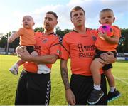 10 August 2018; Inchicore Athletic players Daniel Geraghty and Charlie, age 2, right, and Stephen Kinch and Alfie prior to the Irish Daily Mail FAI Cup First Round match between Inchicore Athletic and St Patrick's Athletic at Richmond Park in Inchicore, Dublin. Photo by Stephen McCarthy/Sportsfile