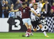 10 August 2018; Gordan Walker of Cobh Ramblers in action against Sam Byrne of Dundalk during the Irish Daily Mail FAI Cup First Round match between Dundalk and Cobh Ramblers at Oriel Park, in Dundalk. Photo by Ben McShane/Sportsfile