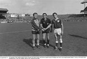 18 September 1983; Dublin captain Tommy Drumm, left shakes hands with Galway captain Seamus McHugh with referee Sean MagEochaidh, Dublin v Galway, All Ireland Senior Football Final, Croke Park, Dublin. Photo by Ray McManus/Sportsfile