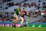 11 August 2018; Conor Raftery of Galway is tackled by Cian McBride of Meath during the Electric Ireland GAA Football All-Ireland Minor Championship semi-final match between Galway and Meath at Croke Park in Dublin. Photo by Ray McManus/Sportsfile