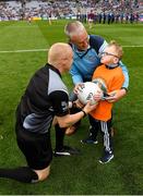 11 August 2018; GAA legend and former Dublin goalkeeper John O'Leary who walked onto the pitch with his son Tom, age 7, who presented the ball to the referee Barry Cassidy, on behalf of the Jack & Jill Children's Foundation at Croke Park in Dublin. Tom, who has a very rare condition, has been supported by Jack & Jill home nursing care and John is a board member and ambassador for the charity. Photo by Ray McManus/Sportsfile
