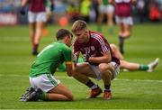 11 August 2018; Seán Coffey of Meath is consoled by Éanna McCormack of Galway after the Electric Ireland GAA Football All-Ireland Minor Championship semi-final match between Galway and Meath at Croke Park in Dublin. Photo by Ray McManus/Sportsfile