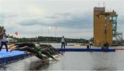 11 August 2018; Competitors dive in during the Mixed Relay Triathlon during day ten of the 2018 European Championships at Strathclyde Country Park in Glasgow, Scotland. Photo by David Fitzgerald/Sportsfile