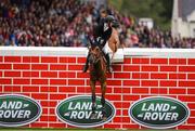 11 August 2018; Michael Pender of Ireland on Hearton Du Bois H looks back as the bricks fall during the Land Rover Puissance during the StenaLine Dublin Horse Show at the RDS Arena in Dublin. Photo by Harry Murphy/Sportsfile
